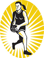 Image showing netball player running with the ball