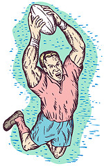Image showing rugby player catching the ball