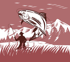 Image showing fly fisherman catching jumping trout