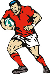 Image showing rugby player running passing the ball