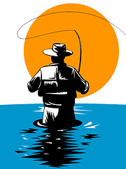 Image showing fly fisherman with rod and reel