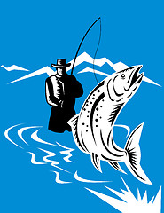 Image showing trout fish jumping reeled by fly fisherman 