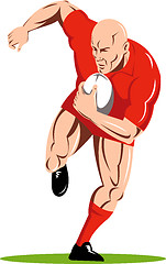 Image showing ugby player running passing the ball