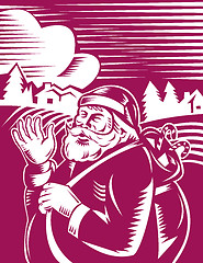 Image showing Father Christmas Santa Claus waving hello