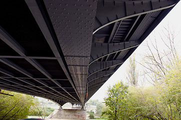 Image showing Metal construction of large bridge over river 