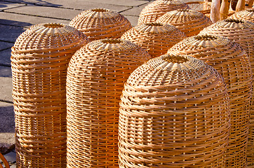 Image showing Wicker wooden handmade baskets sold in market fair 