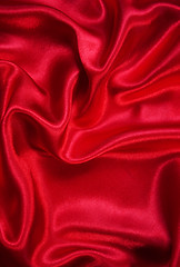 Image showing Smooth elegant red silk as background 