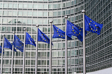 Image showing European flags in front of the European Commission headquarters in Brussels, Belgium.