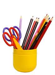Image showing Some scissors and pencils in a cup