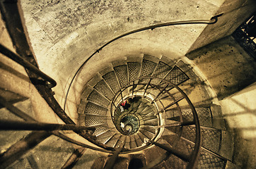 Image showing Spiral Staircase with People Moving