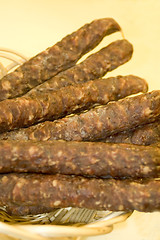 Image showing sausage in wicker basket