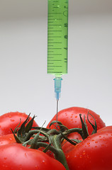 Image showing Injection into fresh red tomato