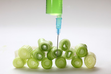 Image showing Injection into fresh young onion