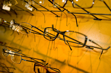 Image showing eyeglasse frames on wall display