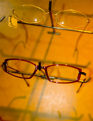 Image showing eyeglasse frames on wall display