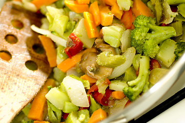 Image showing stir fried vegetables on the range