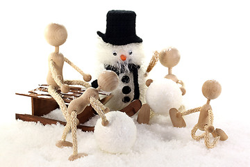 Image showing Families with children building a snowman