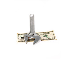 Image showing wrench and dollar bill isolated on white