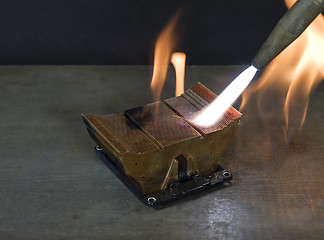 Image showing burning a cooling element