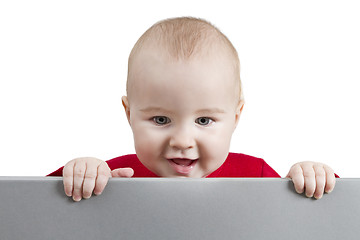 Image showing young child holding shield