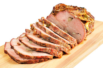 Image showing Roast pork on a wooden board