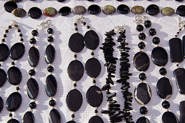 Image showing Dark black jewelry necklace sell in  fair market 