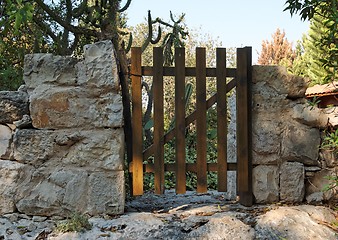 Image showing Small wooden wicket or gate of Mediterranean house