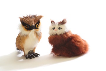 Image showing Pair of cute fluffy toys: kitten and owl, isolated