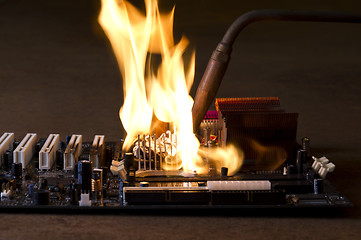 Image showing burning computer main board