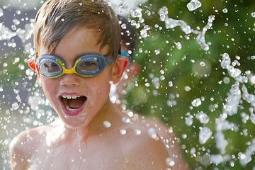 Image showing child playing in the water