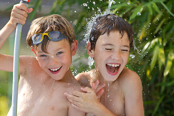 Image showing children playing in the water