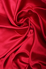 Image showing Smooth elegant red silk as background 