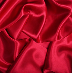 Image showing Smooth elegant red silk as background 