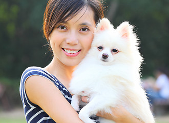 Image showing Young girl with dog