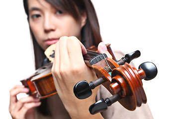 Image showing Young woman play violin