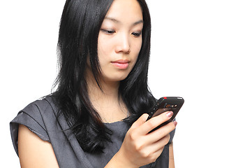 Image showing girl reads sms on phone