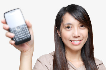 Image showing girl holding out mobile phone
