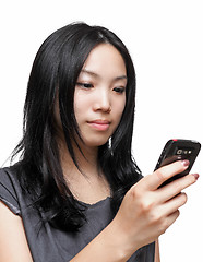 Image showing woman sms text message on phone