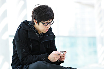 Image showing man text message