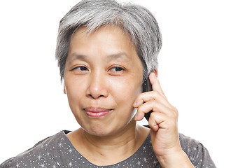 Image showing mature woman using mobile phone