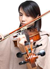 Image showing Young woman play violin