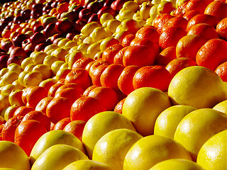 Image showing Tasty fruits oranges and apples