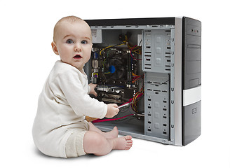 Image showing young child working on open computer