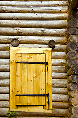 Image showing Old log house background new wooden door of board 