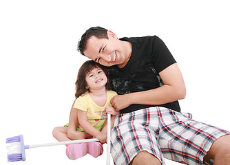 Image showing Father and daughter playing together and looking camera