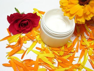 Image showing Hand-made beauty cream with flowers (rose and calendula)