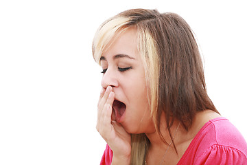 Image showing Yawning tired woman, caucasian model isolated on white background.