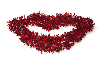 Image showing Lip Shaped Red Tinsel on White