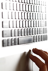 Image showing Young woman working on laptop