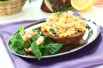 Image showing Scrambled eggs with dill and shrimp